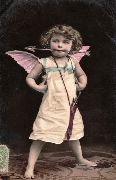 cupid with arrow in the mouth vintage 1