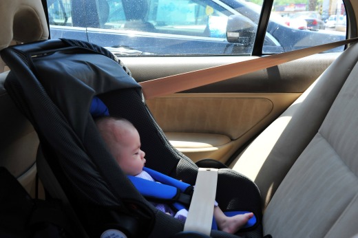A baby is left in a car seat