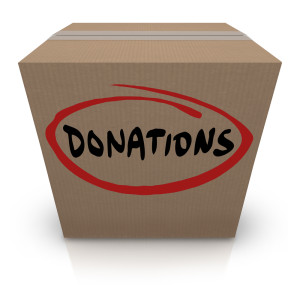 The word Donations on a cardboard box to illustrate a food or clothing drive for needy or homeless people or underprivileged in poverty stricken countries